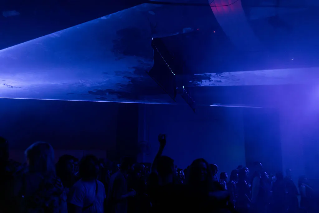 Laser reflections stretching over the crowd